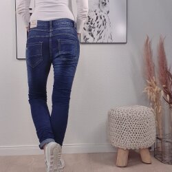 Jeans mit langer Schmuck Knopfleiste