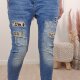Boyfriend destroyed Jeans mit Animal Print und Pailletten M